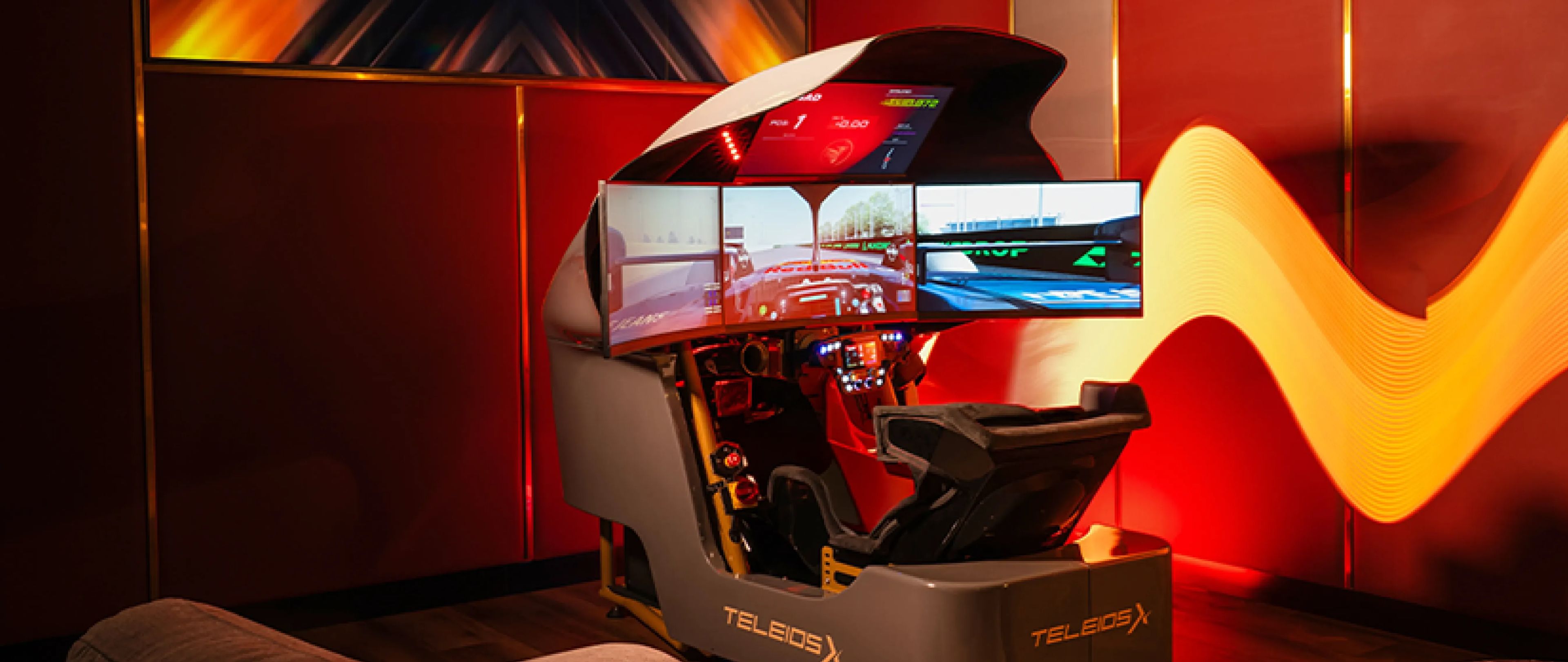 TeleiosX VIP Bay with personal simulator and large screen TV